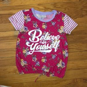 Pink floral graphic tee.